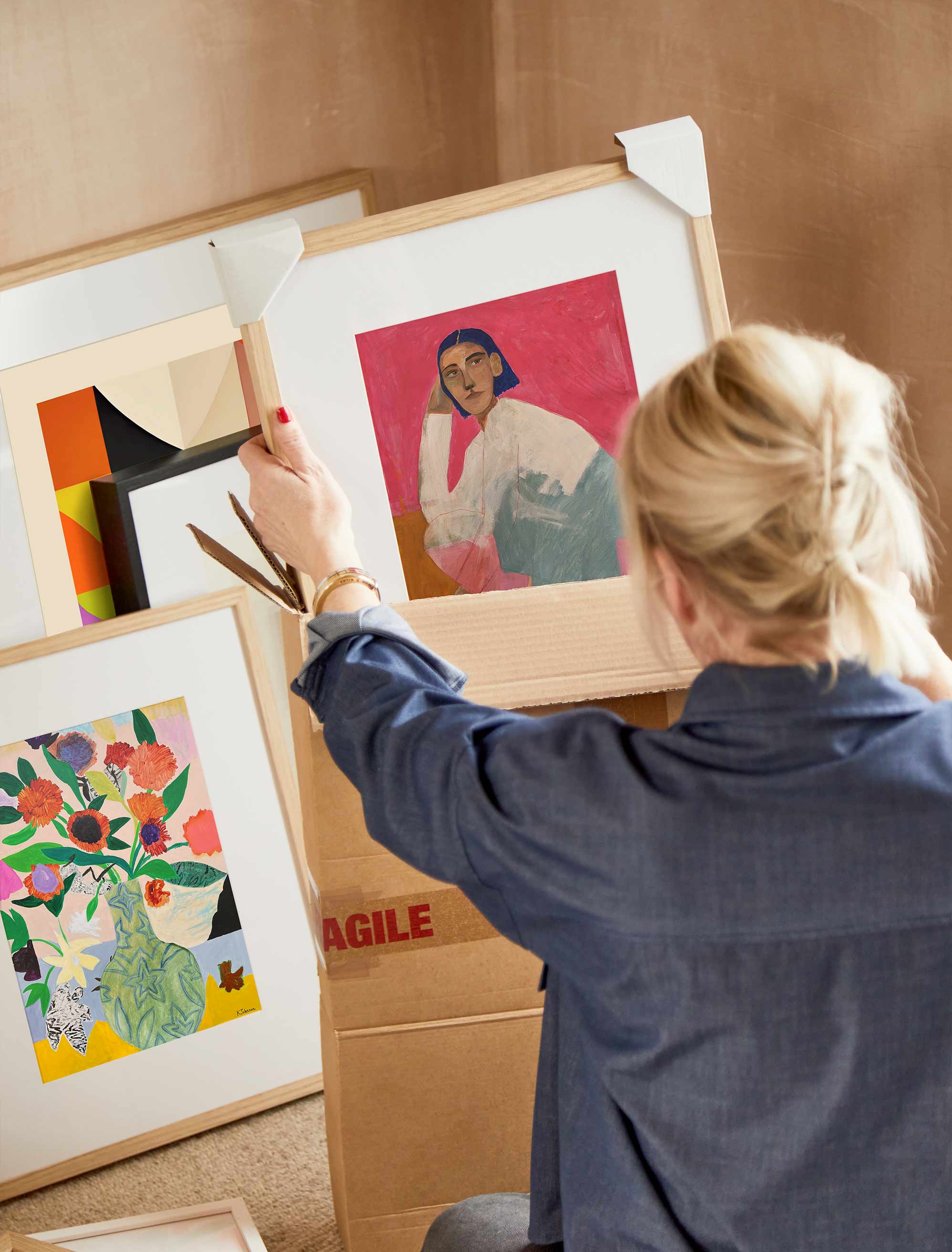 Preparing different artworks for moving.