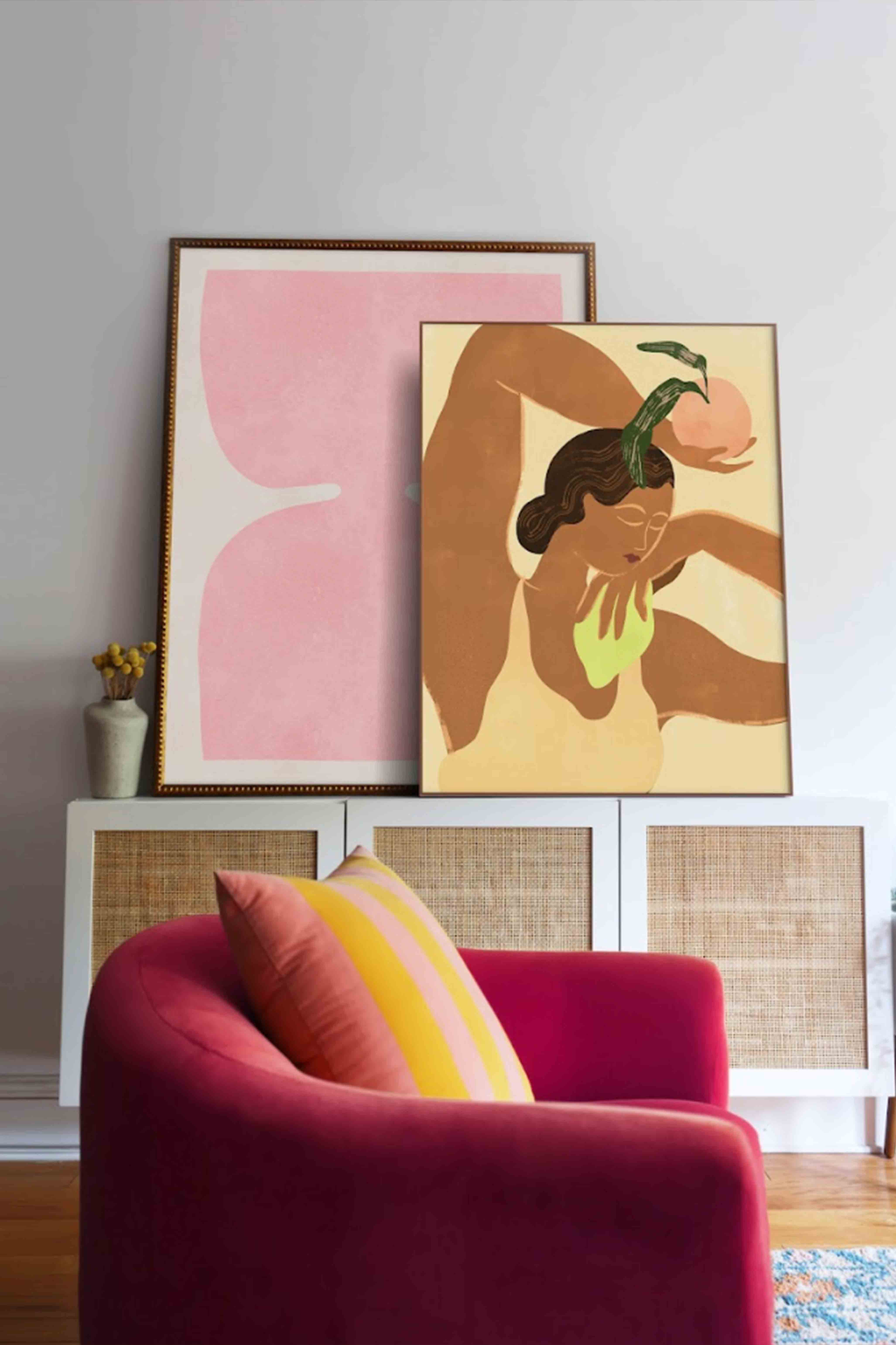 Wall art can complement furniture style in color tone and style.