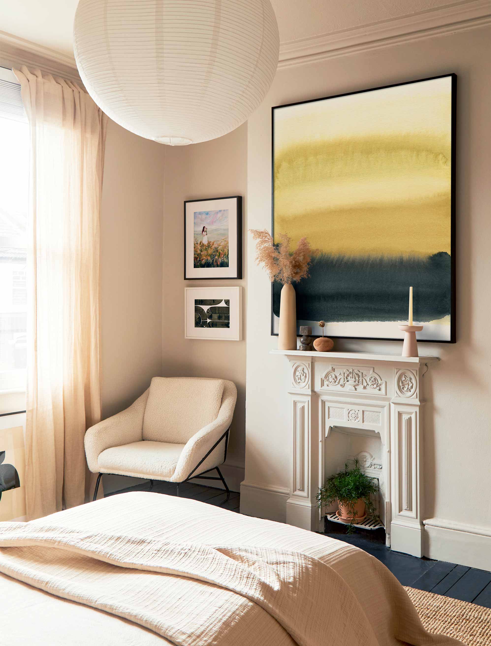 A cozy home comes from comfort first, then art that echoes the colors and pieces you already love.