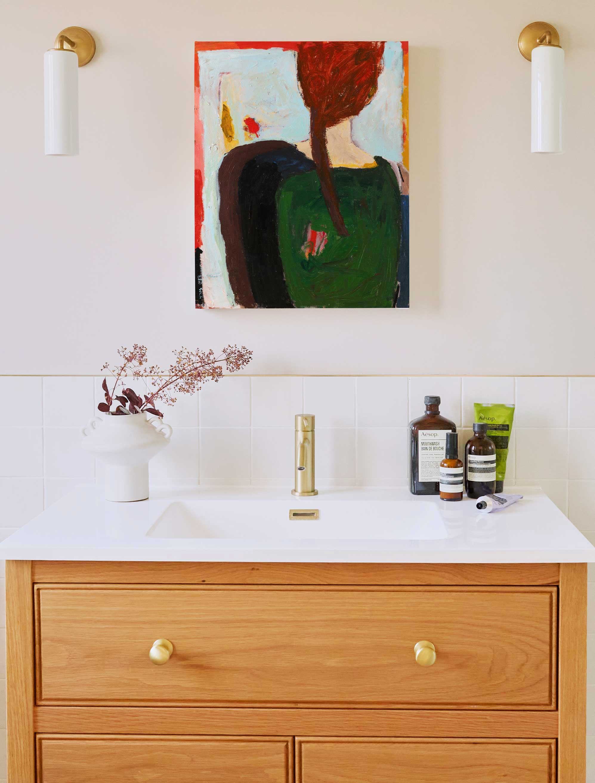 Even the smallest room in the house feels finished with the right piece of art in it.